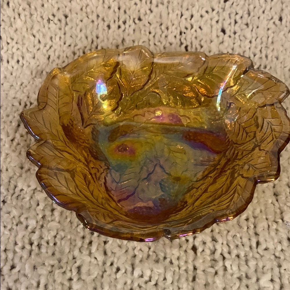 Iridescent amber Indiana carnival glass candy dish.
